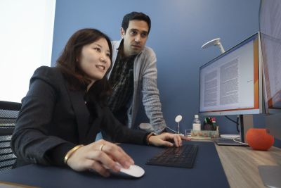 UCI Nursing Faculty Jung In Park and Amir Rahmani working on office computer