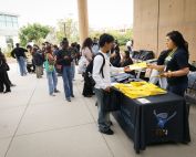 High school students signing in for COHS Choose Your Major Conference